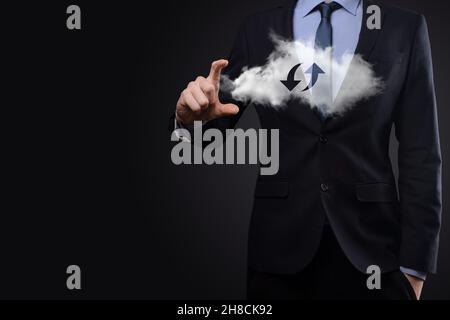 Cloud technology. Polygonal wireframe cloud storage sign with two arrows up and down on dark . Cloud computing, big data center, future infrastructure Stock Photo