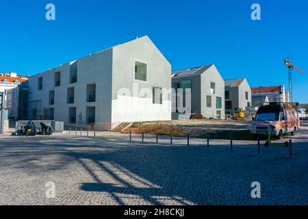 Lisbon, Portugal, New residential Building Construction Site, contemporary architecture (Docas et Belem neighborhood), and climate change Stock Photo