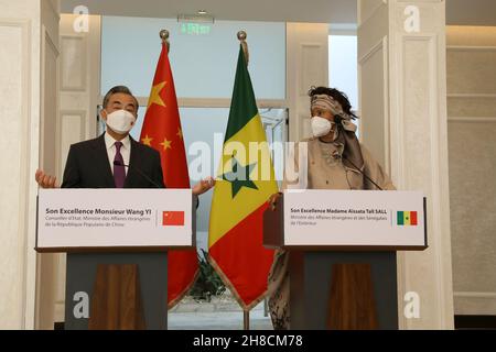 Dakar, Senegal. 28th Nov, 2021. Chinese State Councilor and Foreign Minister Wang Yi (L) and Senegalese Foreign Minister Aissata Tall Sall attend a joint press conference in Dakar, Senegal, Nov. 28, 2021. Credit: Liu Chang/Xinhua/Alamy Live News Stock Photo