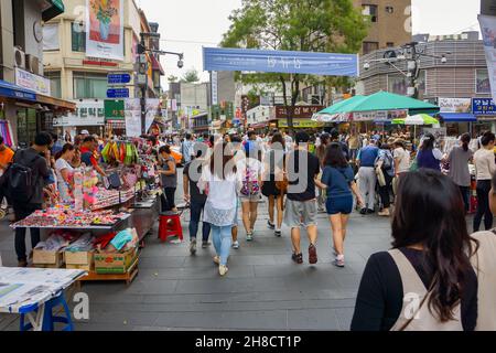 Seoul, South Korea - 1 June 2014, Asian Tourist and local Korean people enjoy walking and shopping around in the shopping street, Seoul, South Korea. Stock Photo