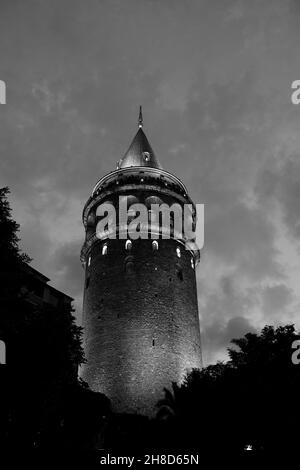 Vertical grayscale shot of the Galata Tower in Istanbul, Turkey Stock Photo