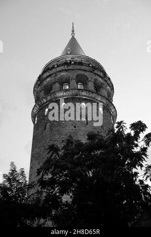 Vertical grayscale shot of the Galata Tower in Istanbul, Turkey Stock Photo