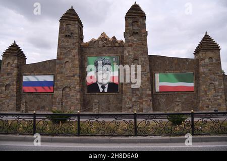 Grozny, Russia - Sept 13, 2021: Architecture in Grozny. Portrait of the former president of the Chechnya Akhmad-Khadzhi Abdulkhamidovich Kadyrov and r Stock Photo