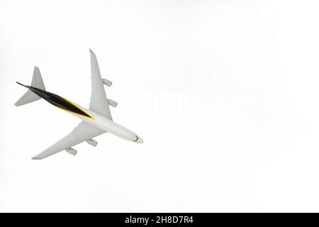 Flying commercial passenger jet plane Take off airplane. Isolated on white background and copy space Stock Photo