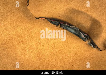 Burning peice of old paper close-up. Vintage and retro design photo Stock Photo