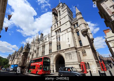 LONDON, UK - JULY 6, 2016: People ride double decker bus at The Strand, London, UK. Transport for London (TFL) operates 8,000 buses on 673 routes. Stock Photo