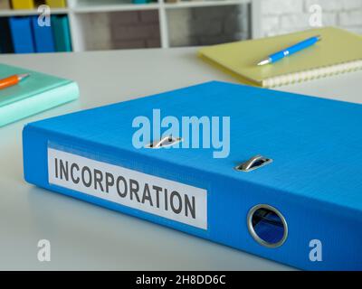 Folder with documents for incorporation on the desk. Stock Photo