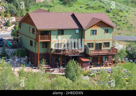 STEAMBOAT SPRINGS, COLORADO - JUNE 19, 2013: Generic house seen from public road in Steamboat Springs, Colorado. Over 5 million homes are sold annuall Stock Photo