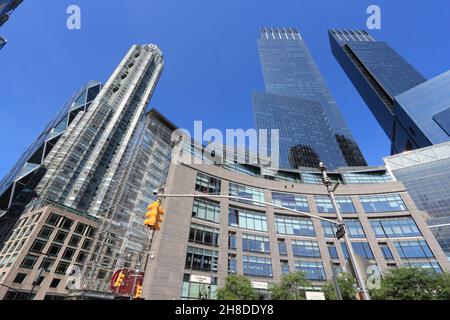 NEW YORK, USA - JULY 4, 2013: Columbus Circle in New York. Columbus Circle with famous Time Warner Center skyscrapers completed in 2003 is one of New Stock Photo