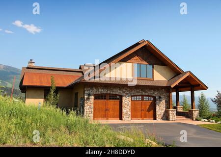 STEAMBOAT SPRINGS, COLORADO - JUNE 19, 2013: Generic house seen from public road in Steamboat Springs, Colorado. Over 5 million homes are sold annuall Stock Photo