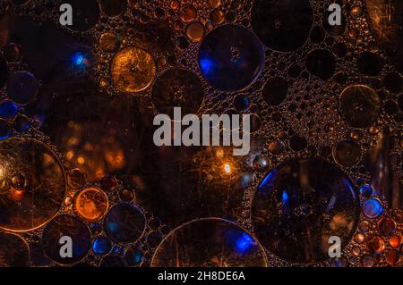 Textured background of oil drops on the water surface Stock Photo