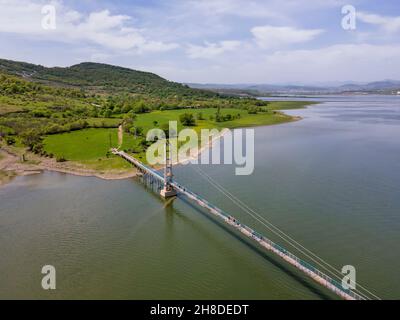Aerial view of pedestrian bridge for the village of Lisitsite over Studen Kladenets Reservoir, Kardzhali Region, Bulgaria Stock Photo