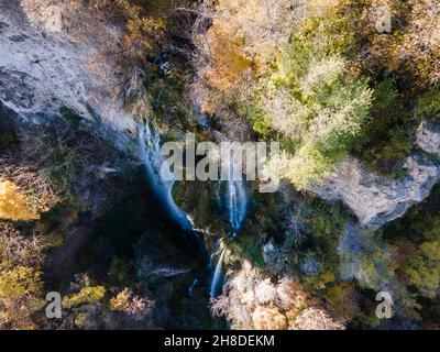 Aerial Autumn view of Polska Skakavitsa waterfall at Zemen Mountain, Kyustendil Region, Bulgaria Stock Photo