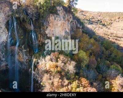 Aerial Autumn view of Polska Skakavitsa waterfall at Zemen Mountain, Kyustendil Region, Bulgaria Stock Photo