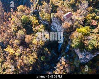 Aerial Autumn view of Polska Skakavitsa waterfall at Zemen Mountain, Kyustendil Region, Bulgaria Stock Photo