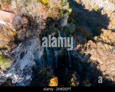 Aerial Autumn view of Polska Skakavitsa waterfall at Zemen Mountain, Kyustendil Region, Bulgaria Stock Photo