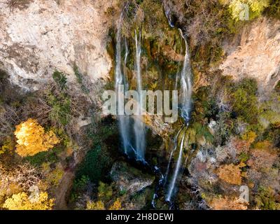 Aerial Autumn view of Polska Skakavitsa waterfall at Zemen Mountain, Kyustendil Region, Bulgaria Stock Photo