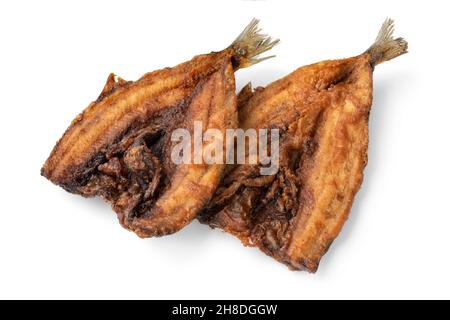Pair of fresh fried herring fillets close up isolated on white background Stock Photo