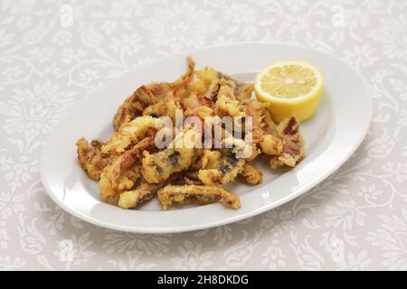 Cantabrian style fried squid, rabas de calamar Stock Photo - Alamy