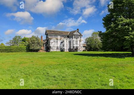 Little Moreton Hall, Cheshire, England, UK, a moated 15th-century half-timbered manor house * PHOTO TAKEN FROM PUBLIC FOOTPATH * Stock Photo