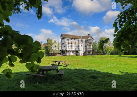 Little Moreton Hall, Cheshire, England, UK, a moated 15th-century half-timbered manor house * PHOTO TAKEN FROM PUBLIC FOOTPATH * Stock Photo