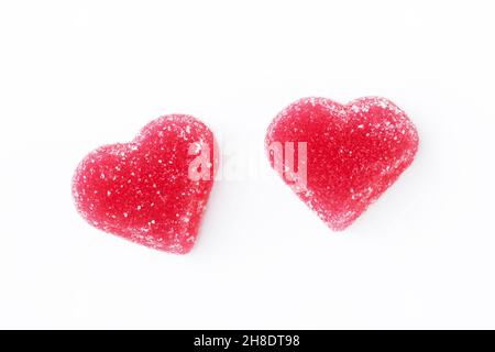 Red heart-shaped marmalade isolated on a white background. Concept valentine's day food, love. Copy space Stock Photo