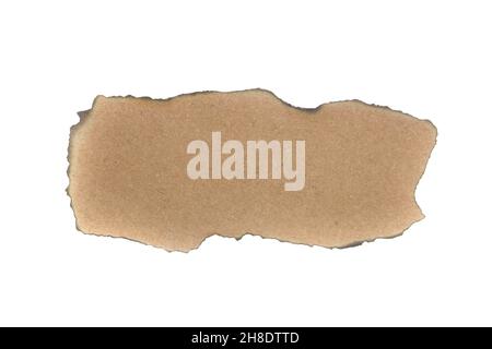 Burnt brown sheet of cardboard isolated on a white background. Burnt hole in a white sheet. Vintage charred paper. Banner. Copy space Stock Photo