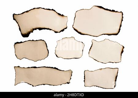 Collection of burnt papers isolated on white background. Banner. Copy space Stock Photo