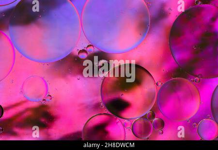 abstract background of velvet violet or light purple colors of oil floating on water Stock Photo