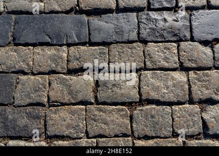 Grey paving stone texture on Red Square in Moscow, pedestrian walkway. Top view. Cement brick squared stone floor background. Concrete paving slabs. H Stock Photo