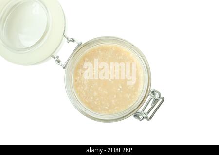 Tahini sauce in a jar isolated on white background Stock Photo