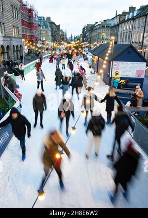 Edinburgh, Scotland, UK. 29th November  2021. Christmas Ice skaters on Lidl-on-Ice ice rink built on on George Street in Edinburgh. This attraction forms part of Edinburgh’s famous Christmas festivities . Iain Masterton/Alamy Live News. Stock Photo