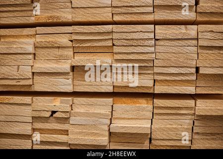 Lumber from boards in warehouse or in store for construction. Stock Photo