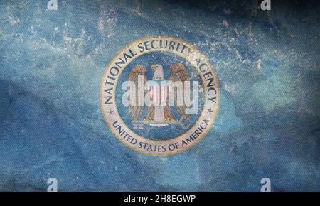 Flag of the NSA (National Security Agency) on a computer binary codes ...