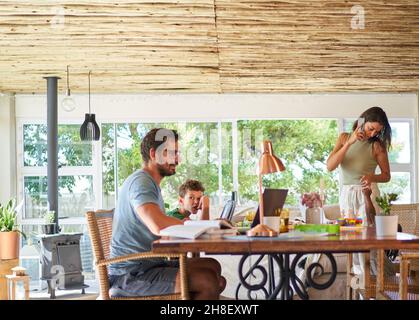 Family working and studying at home Stock Photo