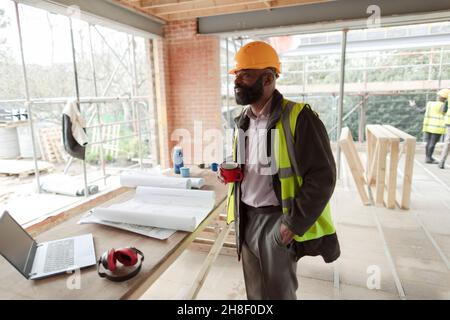 Male architect working in construction site Stock Photo