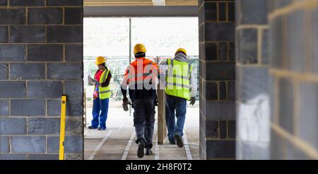 Construction workers at construction site Stock Photo