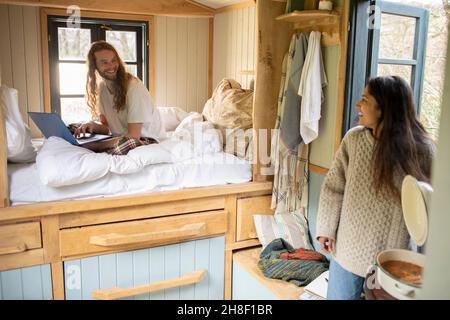 Young couple in tiny cabin rental Stock Photo
