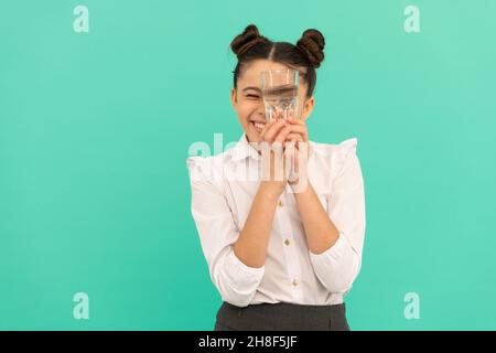 be hydrated. kid hold glass of mineral water. child feel thirsty. Stock Photo