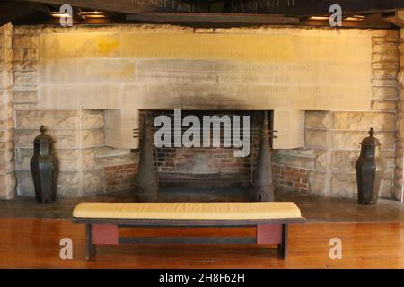 Hillside Home School interior fireplace. Architecture and decor design by Frank Lloyd Wright. Frank Lloyd Wright Foundation. Taliesin Preservation LLC Stock Photo