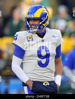 Los Angeles Rams wide receiver Odell Beckham Jr. puts on his helmet during  practice for an NFL …