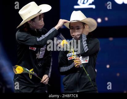 Houston. 29th Nov, 2021. Ito Mima (R)/Hina Hayata of Japan celebrate during the awarding ceremony of the women's doubles event at 2021 World Table Tennis Championships Finals in Houston, the United States on Nov. 29, 2021. Credit: Nick Wagner/Xinhua/Alamy Live News Stock Photo