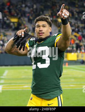 Green Bay, Wisconsin, USA. 02nd Jan, 2022. Green Bay Packers quarterback  Aaron Rodgers #12 congratulates Green Bay Packers wide receiver Allen  Lazard #13 on a touchdown during NFL football game between the