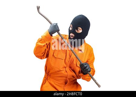 A criminal man in a hidden mask holding crowbar isolated over white background Stock Photo