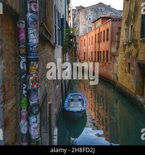 a typical narrow canal in Venice,Italy Stock Photo