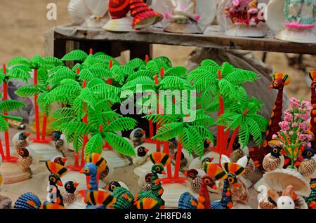 Statues  of Hindu deities made of oysters and cowries Stock Photo