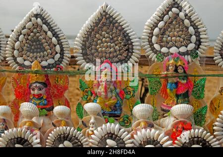 Statues  of Hindu deities made of oysters and cowries Stock Photo