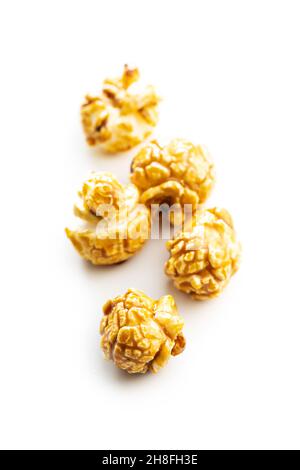 Sweet caramel popcorn isolated on white background. Stock Photo