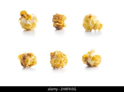 Sweet caramel popcorn isolated on white background. Stock Photo