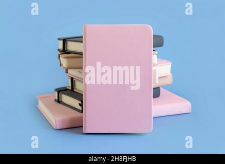 Stack of pink and grey hardcover notebooks on light blue closeup.  Textbook mockup, planner cover with place fot text. Educational, business and organ Stock Photo